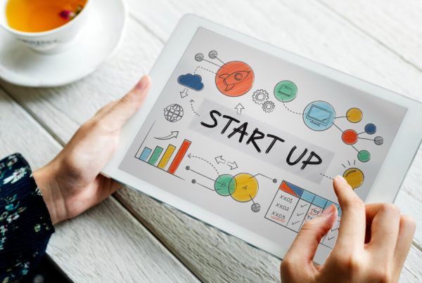 Entrepreneur planning startup growth on digital tablet